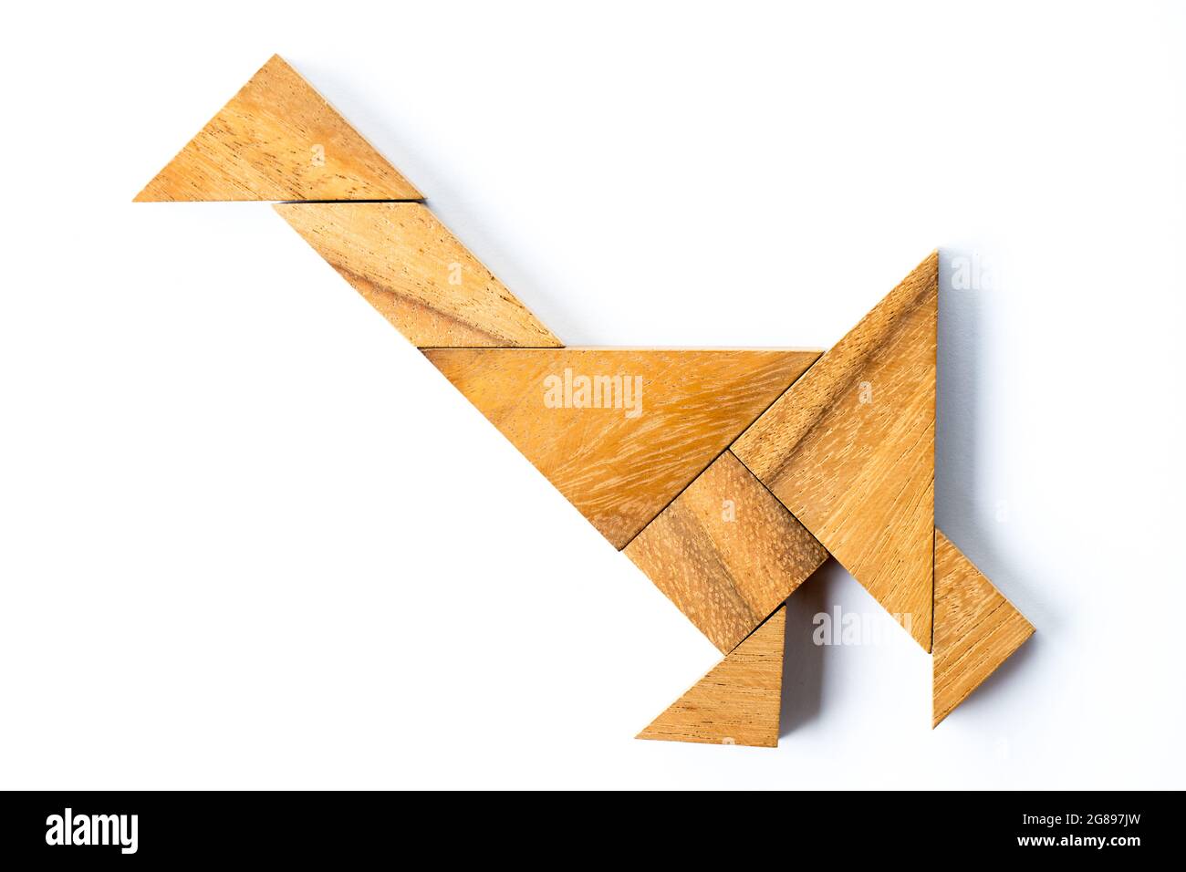 Wood tangram puzzle in walking swan or duck shape on white background Stock  Photo - Alamy