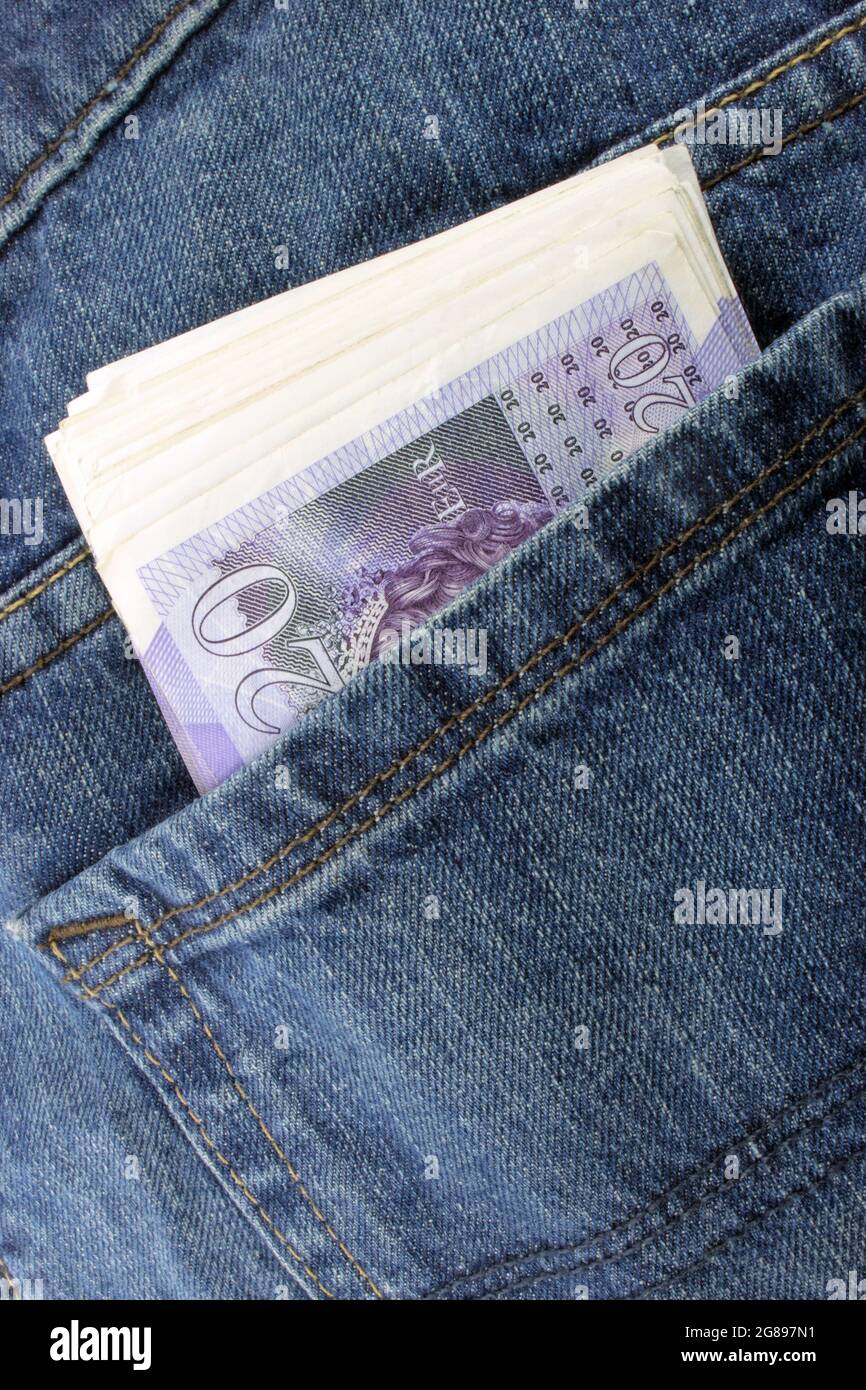 A close up of Sterling notes in a back pocket. Stock Photo