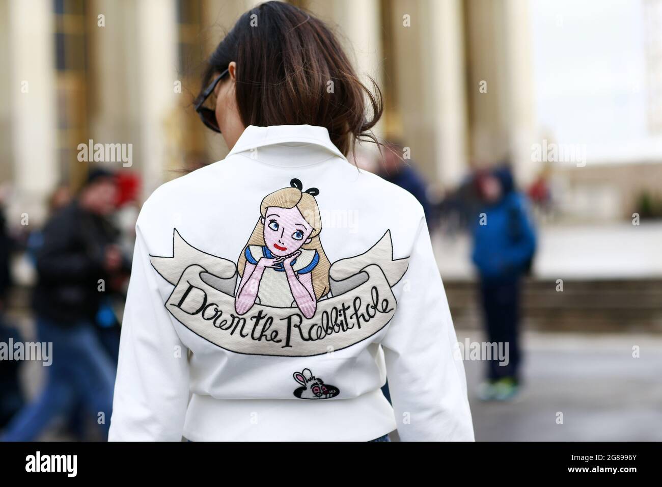 Evangelie Smyrniotaki wears an Olympia Le Tan ropped white zipped jacket  with prints and "Down the Rabbit Hole" princess print and Vetements jeans  Stock Photo - Alamy