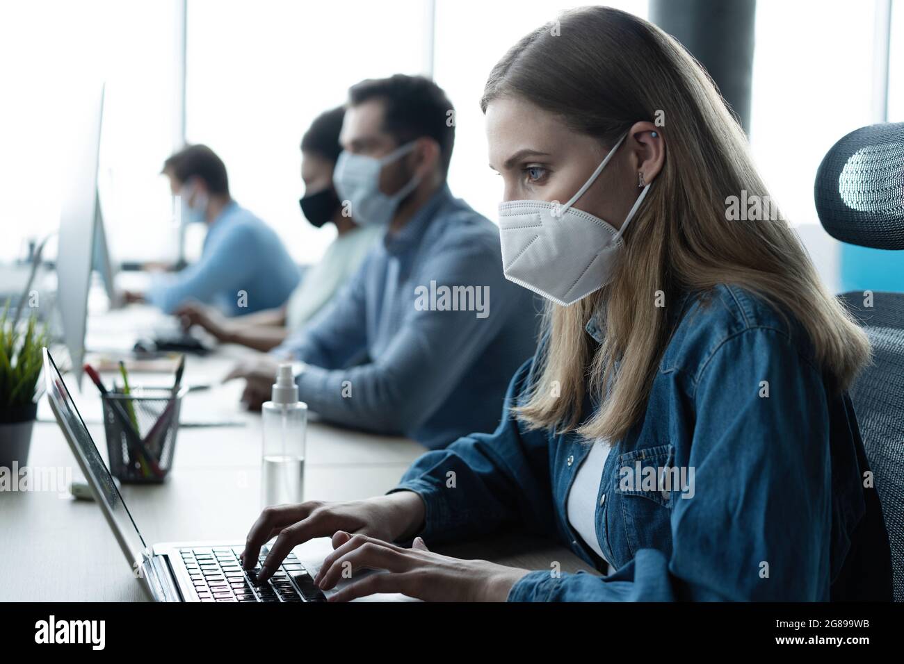 Group of business people wear protective face mask working in office ...