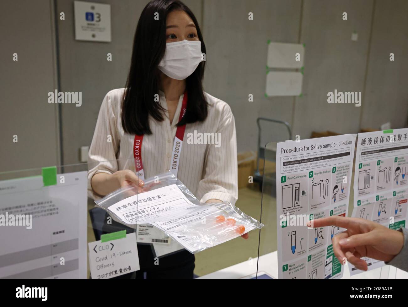 Tokyo Japan July 18 21 A Person Receives A Covid 19 Pcr Self Test Kit At The Main Press Center Of The Summer Olympics The First Covid 19 Case Was Registered In The Tokyo Japan July 18 21 A Person Receives A Covid 19 Pcr Self Test Kit At The Main Press Center Of The Summer Olympics The First Covid 19 Case Was Registered In The