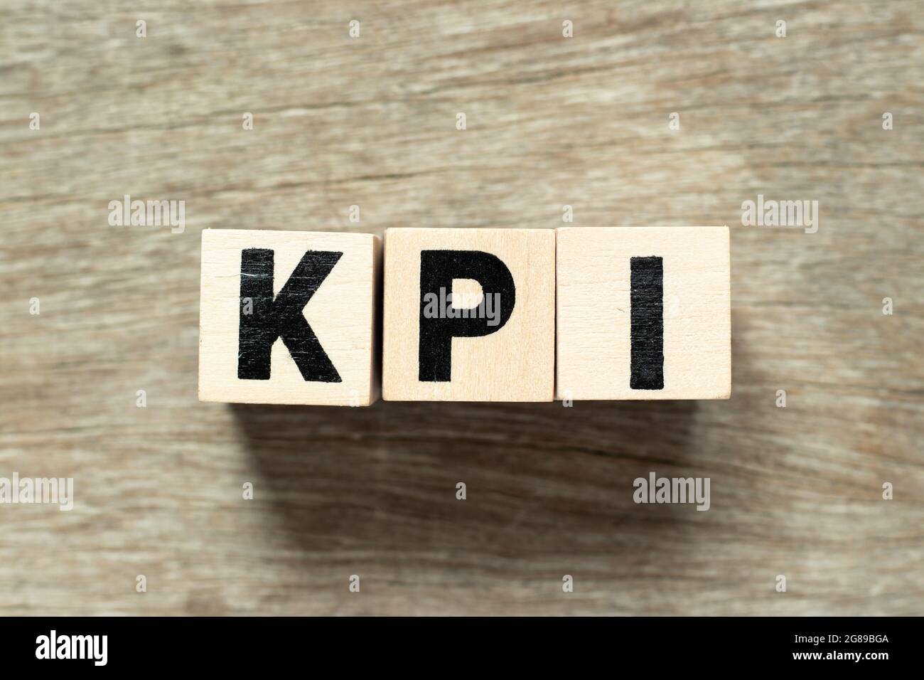 Letter block in word KPI (Abbreviation of key performance indicator) on