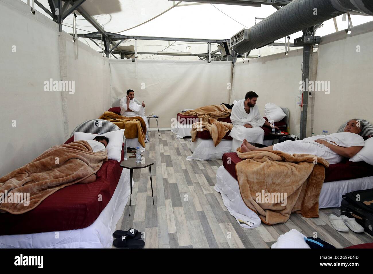 Pilgrims rest inside their tent in the Mina area during the annual Haj  pilgrimage, in the holy city of Mecca, Saudi Arabia, July 18, 2021.  REUTERS/ Ahmed Yosri Stock Photo - Alamy