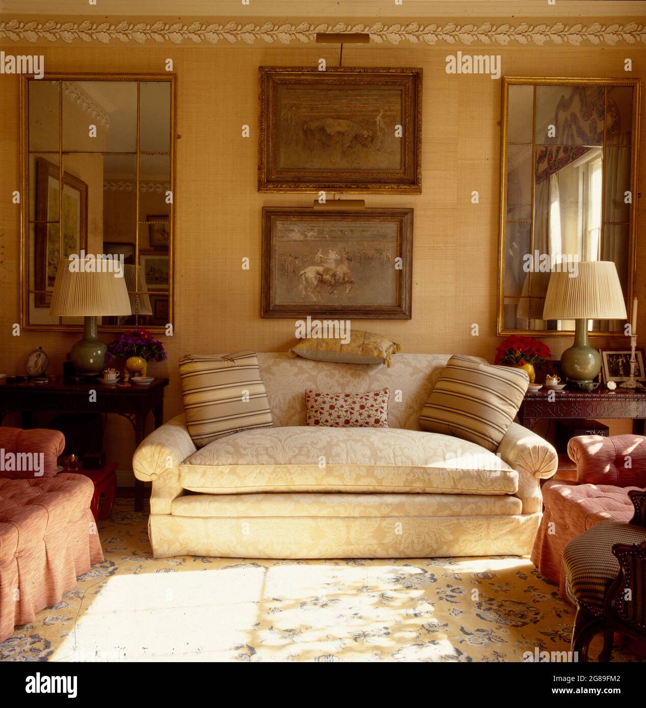 Cream sofa in traditional townhouse living room Stock Photo Alamy