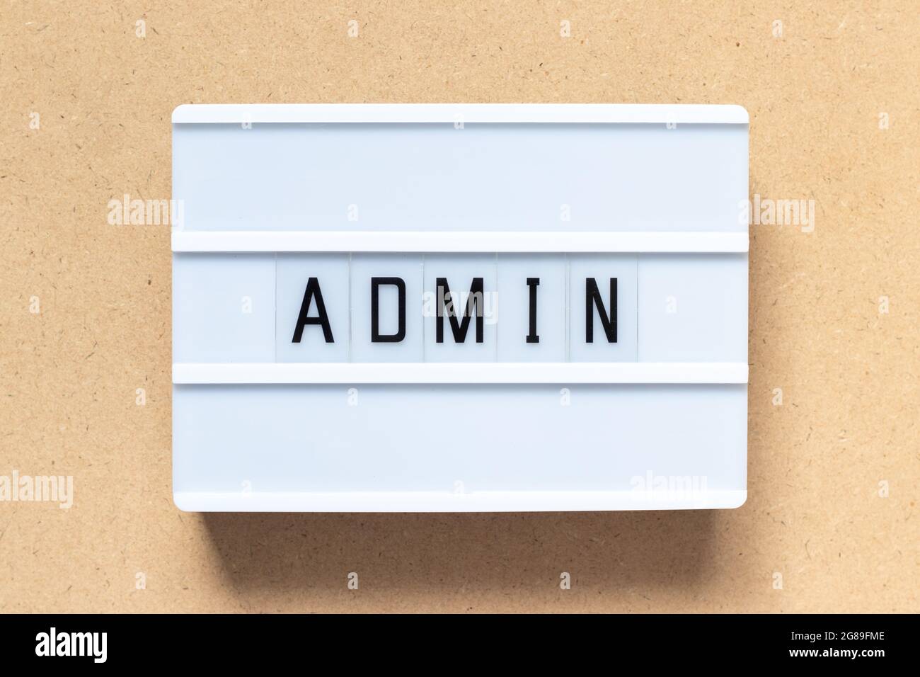 White lightbox with word admin on wood background Stock Photo
