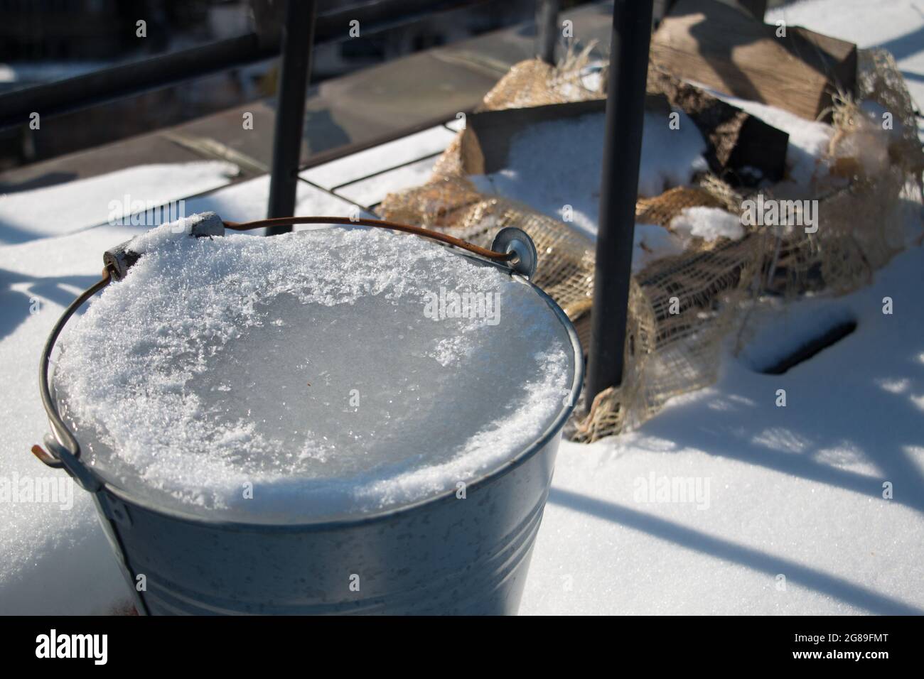 Ice bucket during a cold winter Stock Photo Alamy