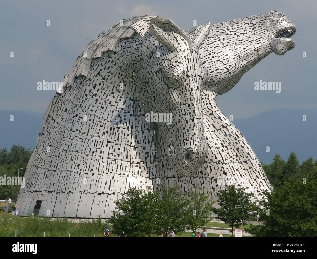 The Kelpies are 30m tall steel sculptures of a pair of horses' heads and have become a much-loved feature of the Scottish landscape and tourist trade. Stock Photo