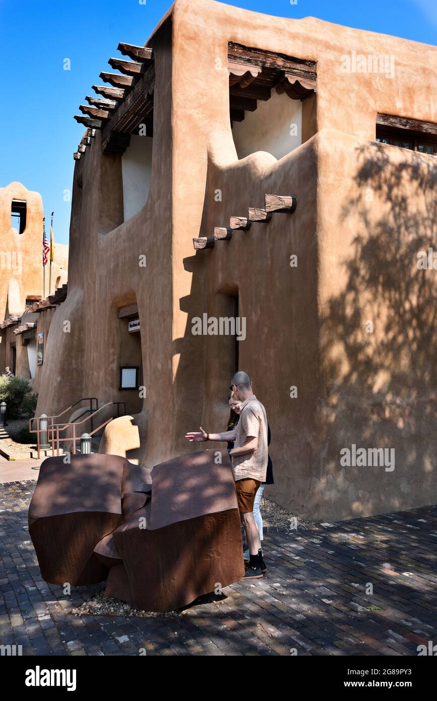 The New Mexico Museum of Art in Santa Fe, New Mexico, opened in 1917, was constructed in the Pueblo Revival architectural style. Stock Photo