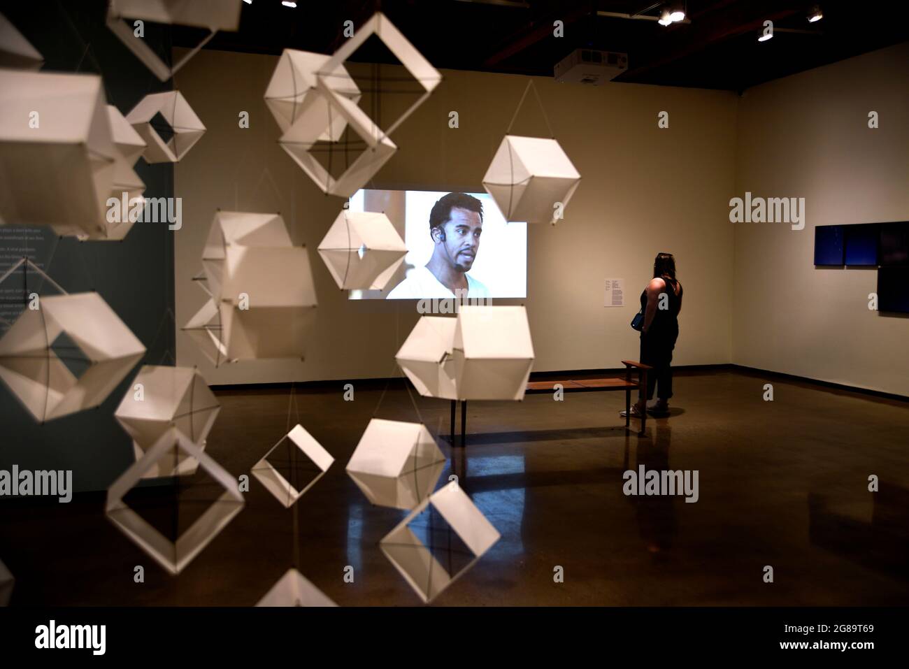 A Museum Visitor Watches A Multi Media Art Installation At The New Mexico Museum Of Art In Santa Fe Stock Photo Alamy
