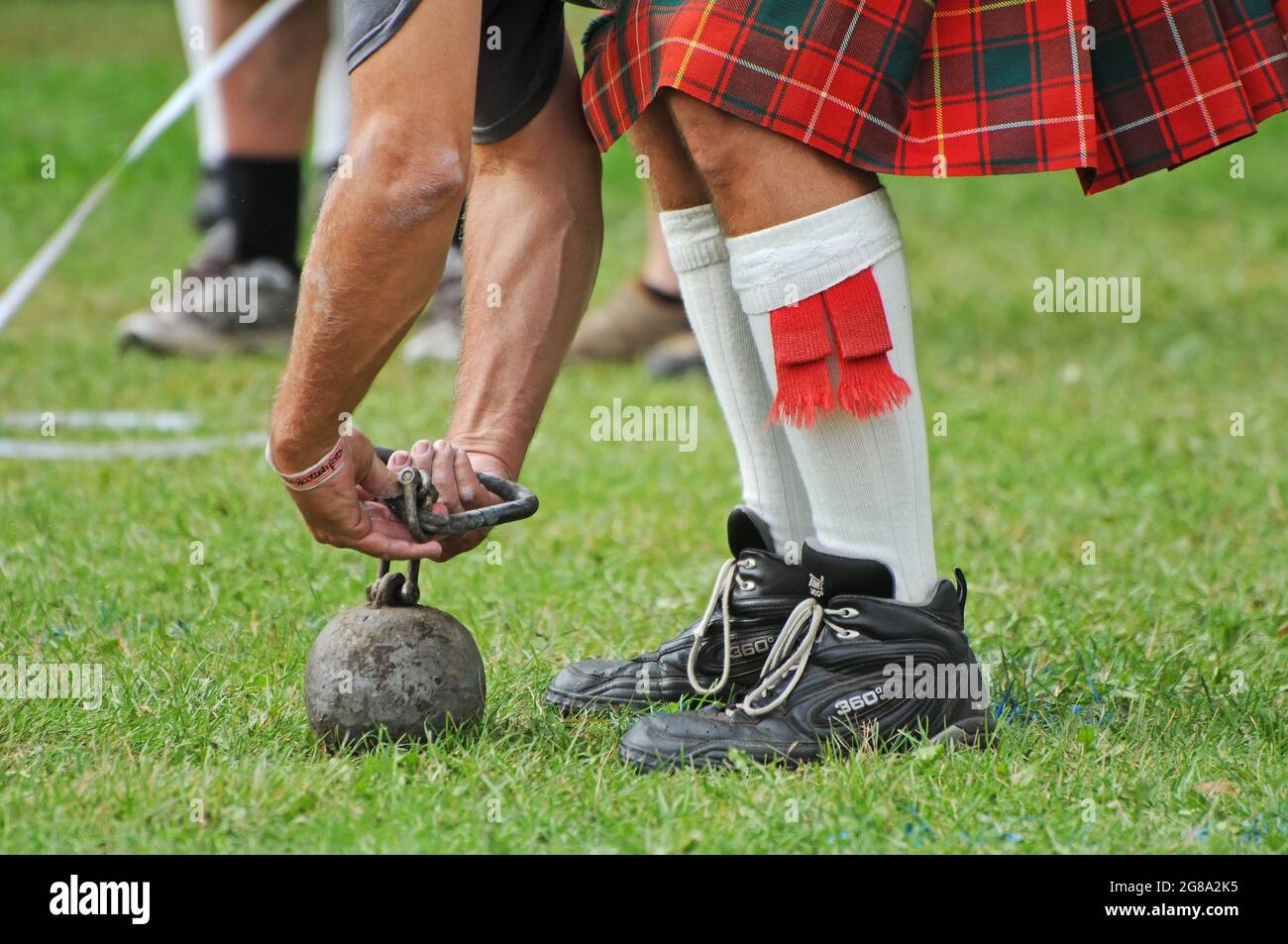 Hammer throw, Scottish highland competition Stock Photo Alamy