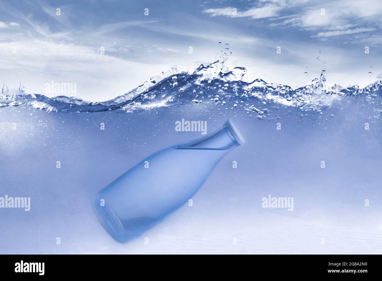 the transparent glass bottle underwater in ocean Stock Photo Alamy
