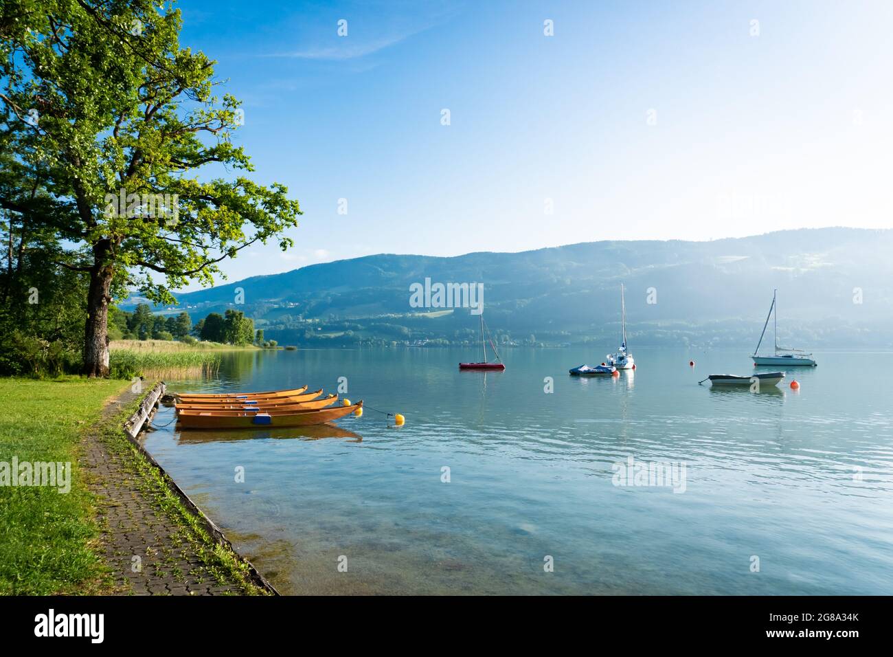 Lake Mondsee in Salzkammergut during summer. Beautiful natural lake in the Austrian Alps. Stock Photo