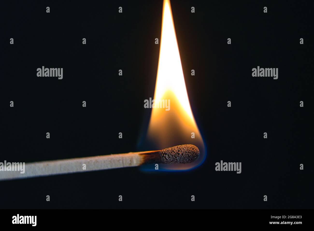 match is burning hot on black Stock Photo