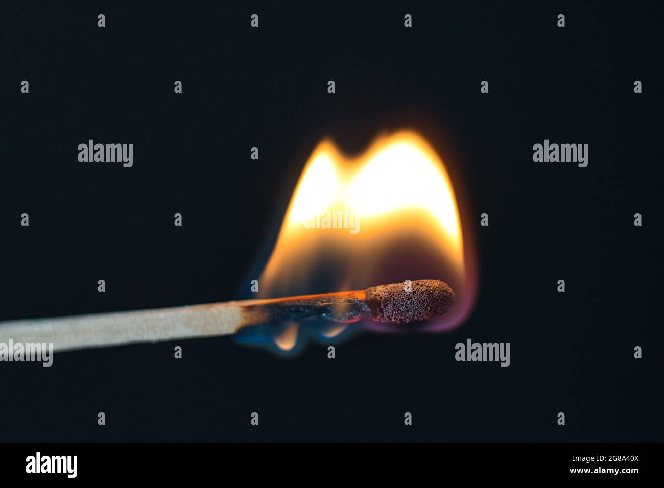 match is burning hot on black Stock Photo