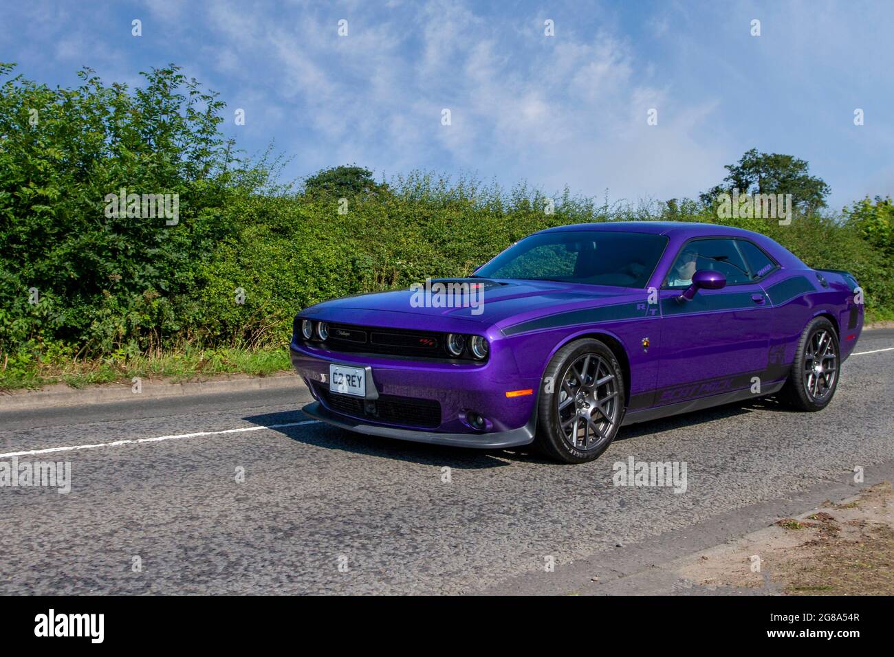 2017 purple Dodge Challenger R/T 392 coupe, American,  Chrysler 3.6 liter V6 Scat Pack Shaker, hemi-scat en-route to Capesthorne Hall classic July car show, Cheshire, UK Stock Photo