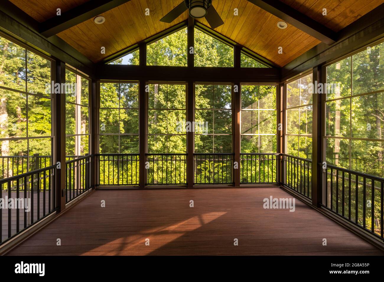 Modern screened porch with plastic windows and composite floor with