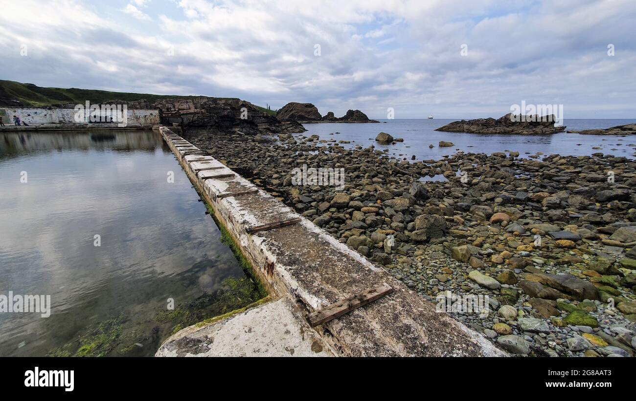Derelict outdoor swimming pool at Tarlair, Banff, Scotland Stock Photo
