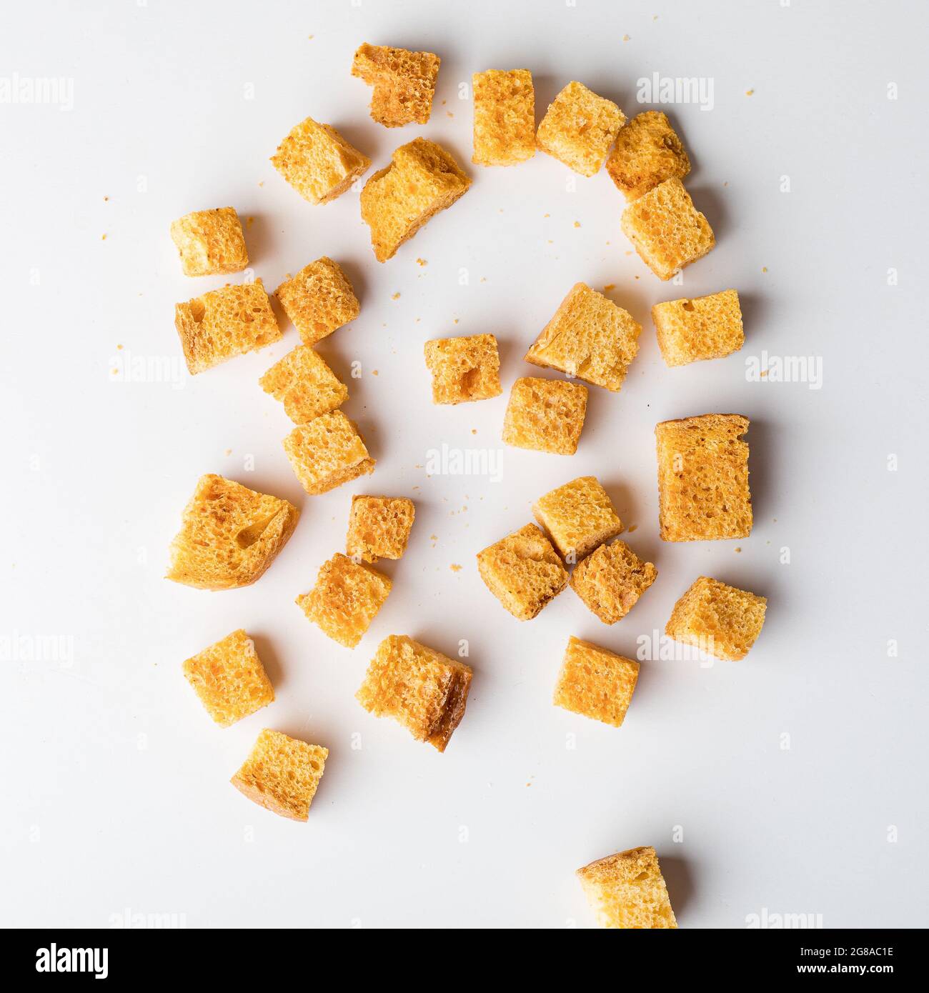 Square breadcrumbs. Ovenfried golden brown bread crumbs. White