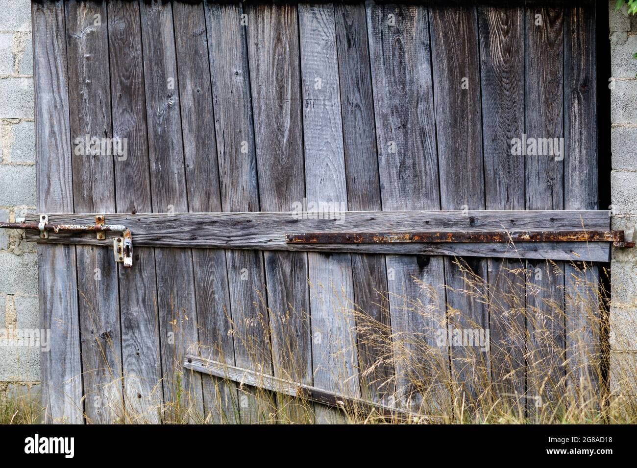 Wooden door of a barn Stock Photo