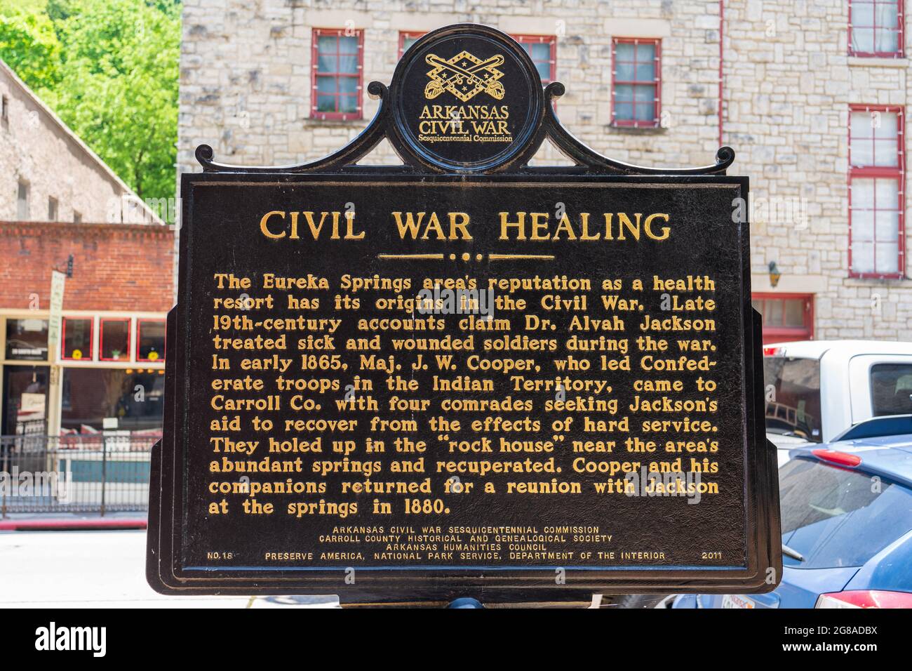 Eureka Springs, AR - June 11, 2021: This sign describes Eureka Springs as a health resort in the late 19th century and its connection to the Civil War Stock Photo