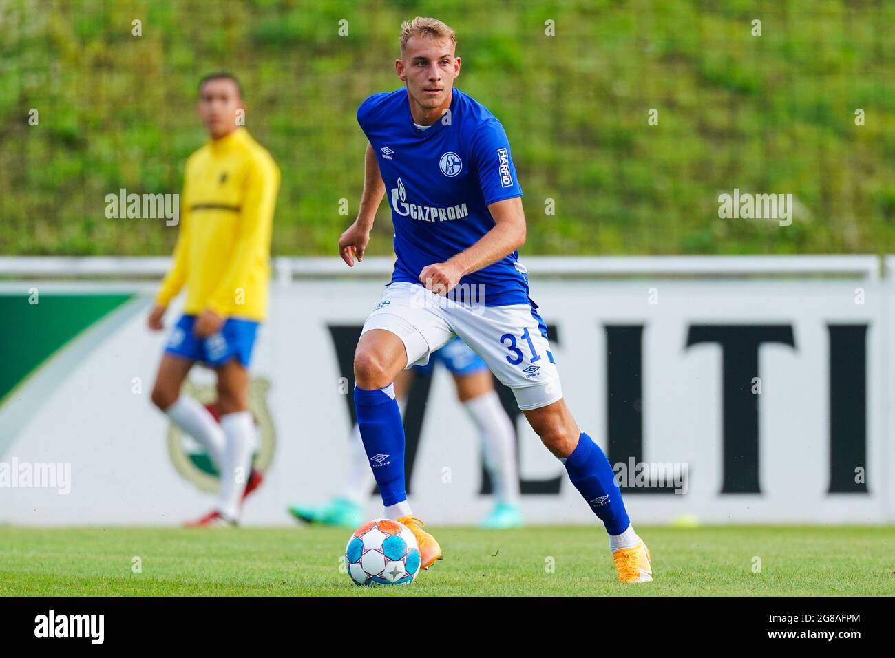 GELSENKIRCHEN, GERMANY - JULY 16: Timo Becker of Schalke 04 controlls the  ball during the Club Friendly match between FC Schalke 04 and Vitesse at  Parkstadion on July 16, 2021 in Gelsenkirchen,