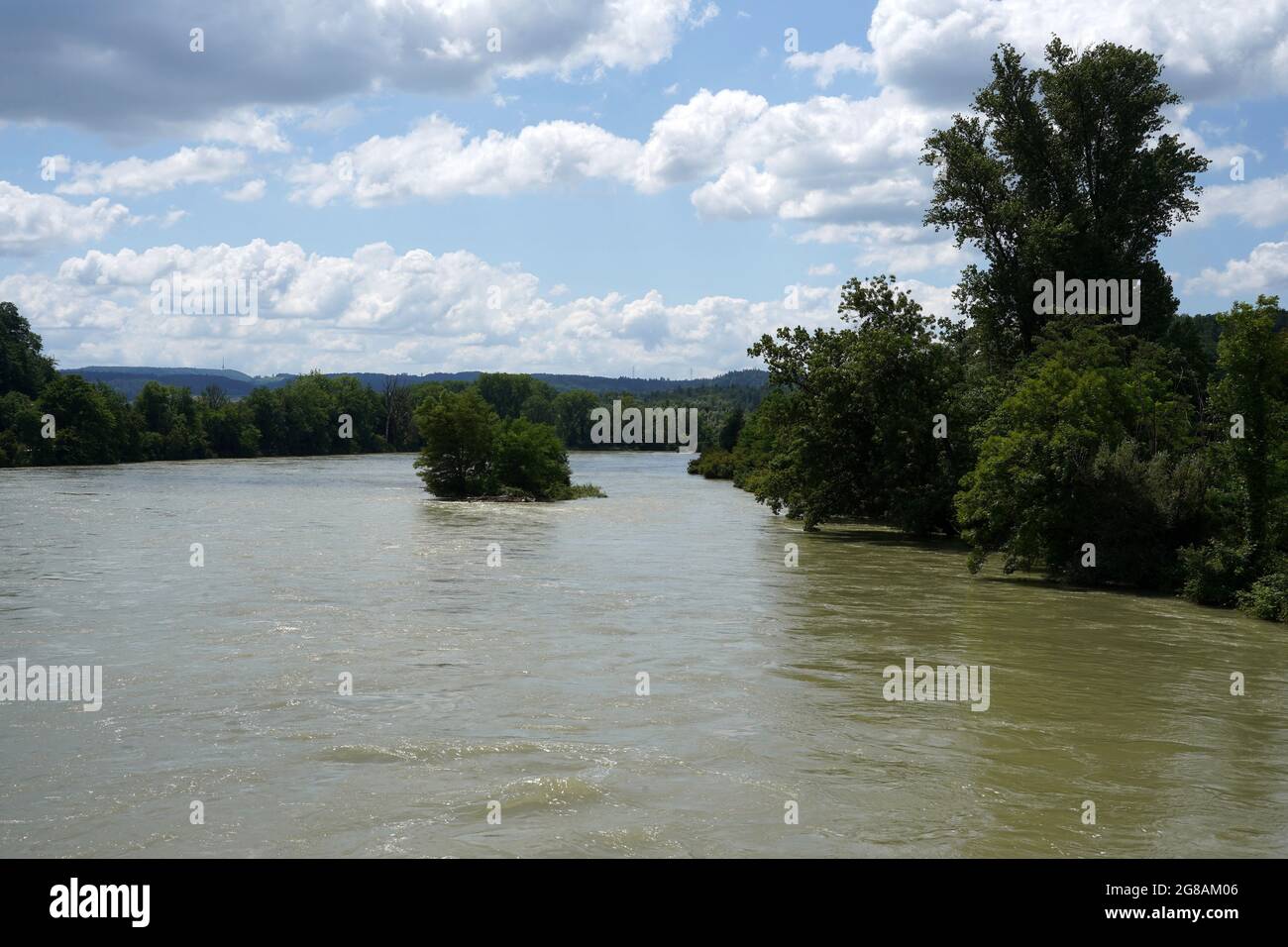 River Rhine on the border between Germany and Switzerland out of banks. High water is caused by heavy rains in  July 2021. Stock Photo