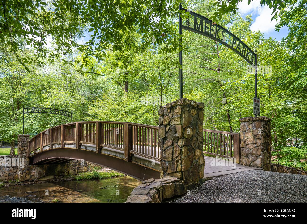 Mountain stream footbridge over Butternut Creek connecting to hiking trails at Meeks Park in Blairsville, Georgia. (USA) Stock Photo