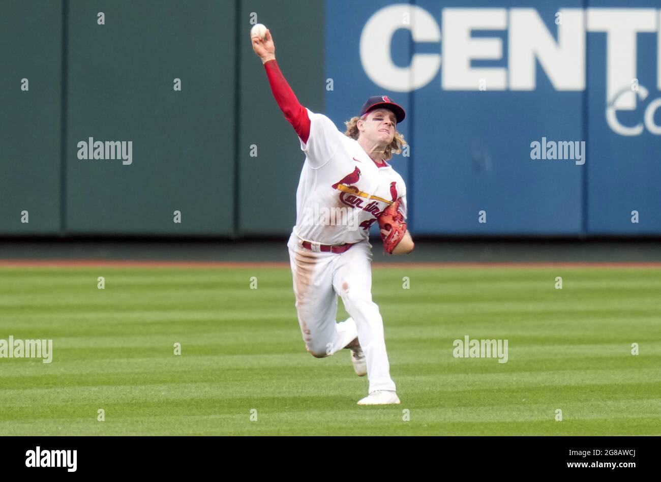 St. Louis Cardinals Harrison Bader makes a throw to first base in