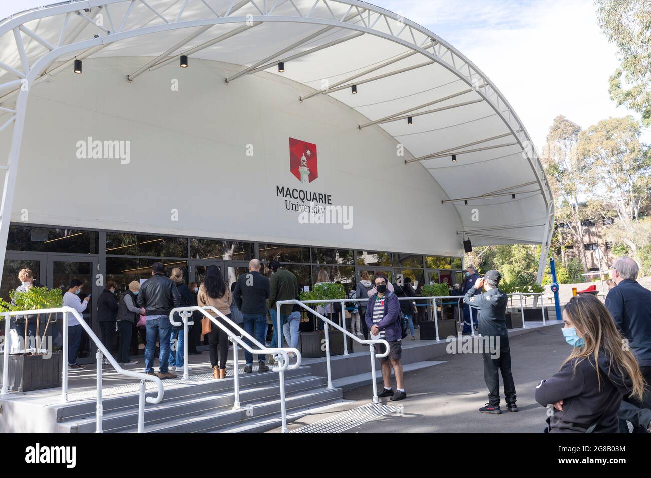 Covid 19 vaccination centre on Macquarie University campus, people queue at the vaccination centre in Sydney to receive the vaccine for covid 19 Stock Photo