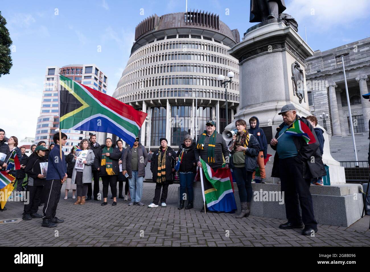 WELLINGTON, New Zealand - 19 July 2021 - A group of South African expatriates protest outside the New Zeland parliament to high light the plight of th Stock Photo