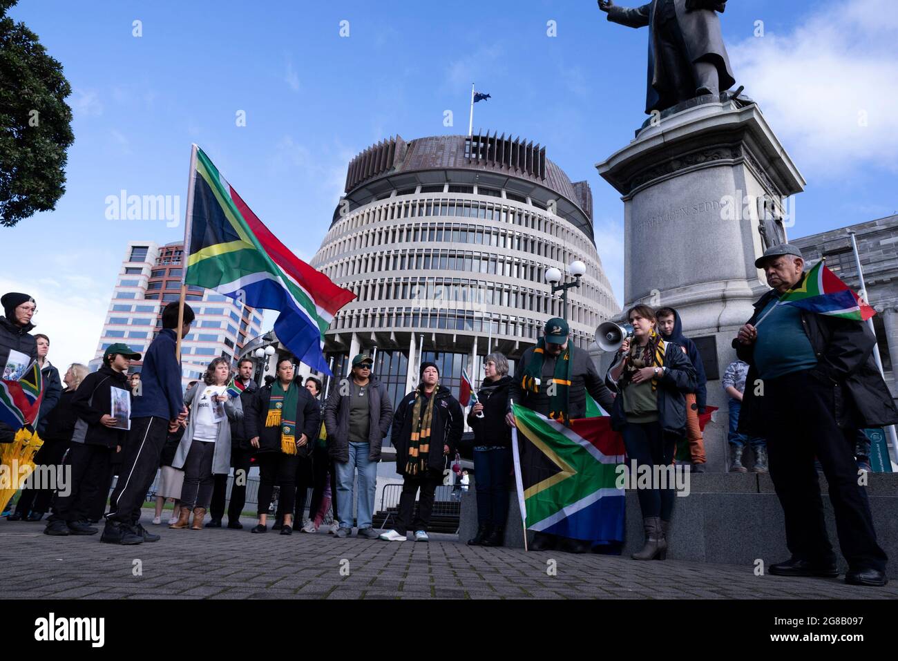 WELLINGTON, New Zealand - 19 July 2021 - A group of South African expatriates protest outside the New Zeland parliament to high light the plight of th Stock Photo