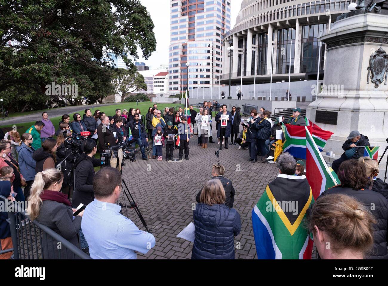 WELLINGTON, New Zealand - 19 July 2021 - A group of South African expatriates protest outside the New Zeland parliament to high light the plight of th Stock Photo