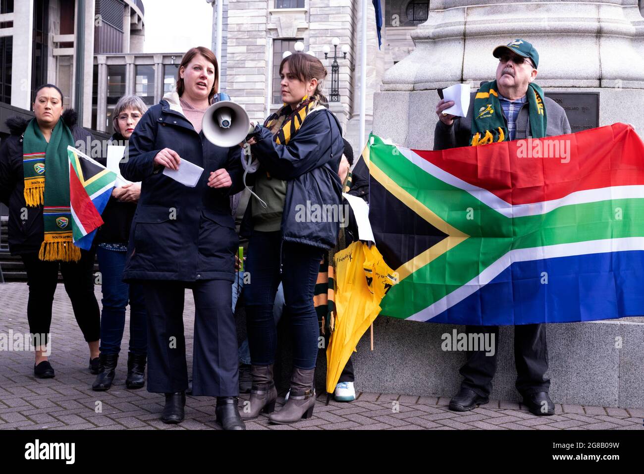 WELLINGTON, New Zealand - 19 July 2021 - A group of South African expatriates protest outside the New Zeland parliament to high light the plight of th Stock Photo