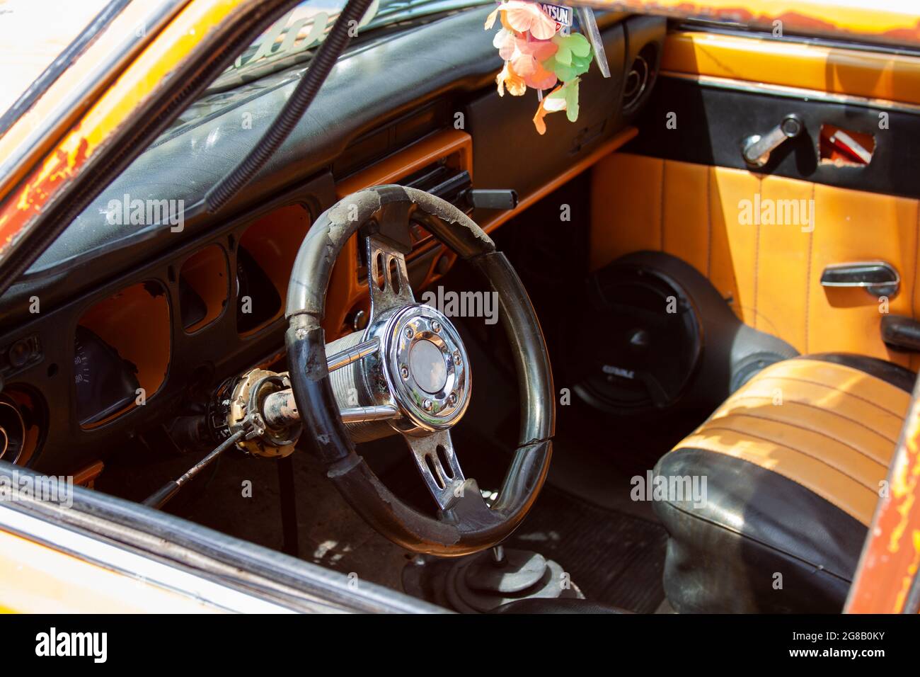 The interior of a very old Datsun car on the Mexican streets. Stock Photo