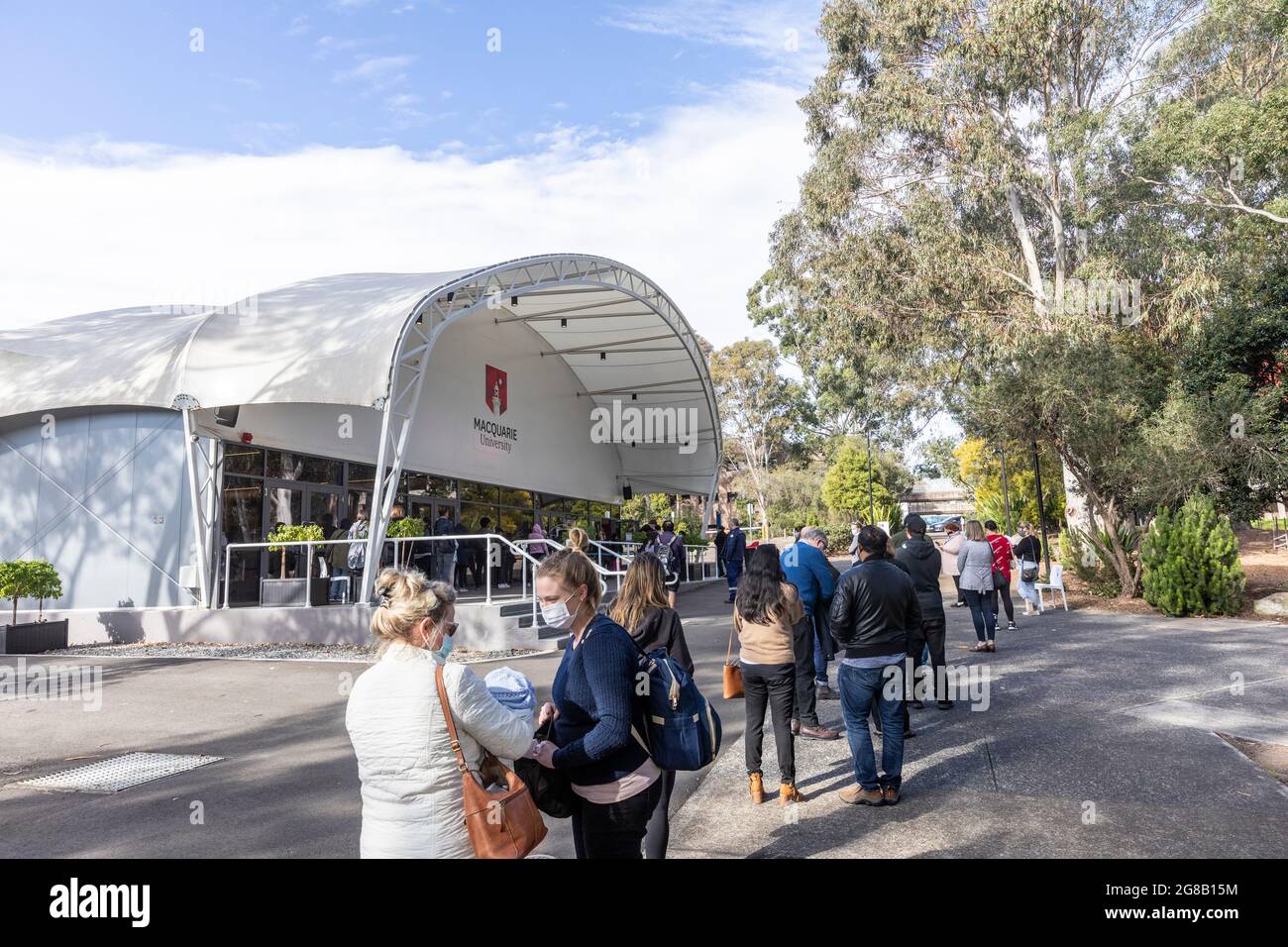 Covid 19 vaccination centre on Macquarie University campus, people queue at the vaccination centre in Sydney to receive the vaccine for covid 19 Stock Photo