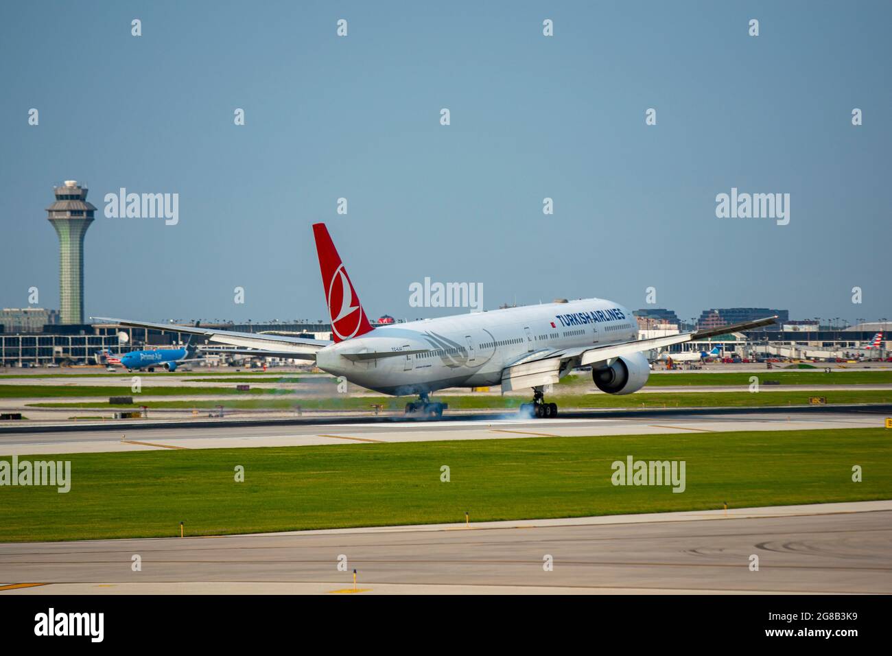 Chicago, IL, United States - July 18, 2021: Turkish Airlines Boeing 777-300ER (registration TV-LJJ) landing at Chicago O'Hare International Airport. Stock Photo