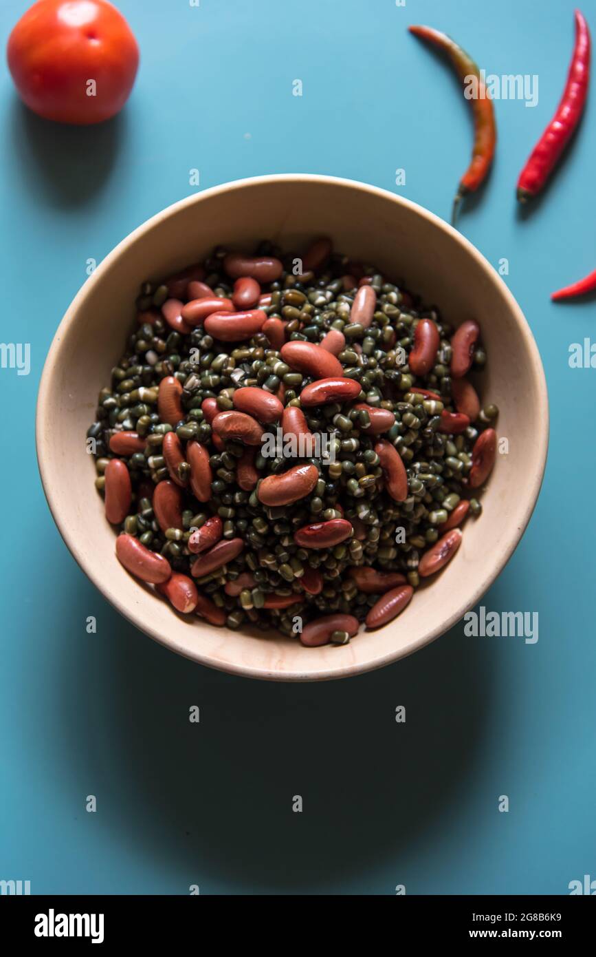 Red kidney beans and black urad or kaali dal in a bowl with use of selective focus Stock Photo