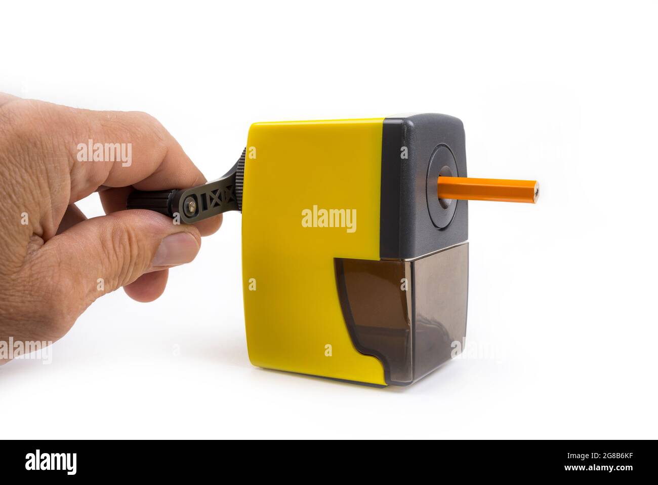 Pencil sharpener with a hand crank on a white Stock Photo Alamy