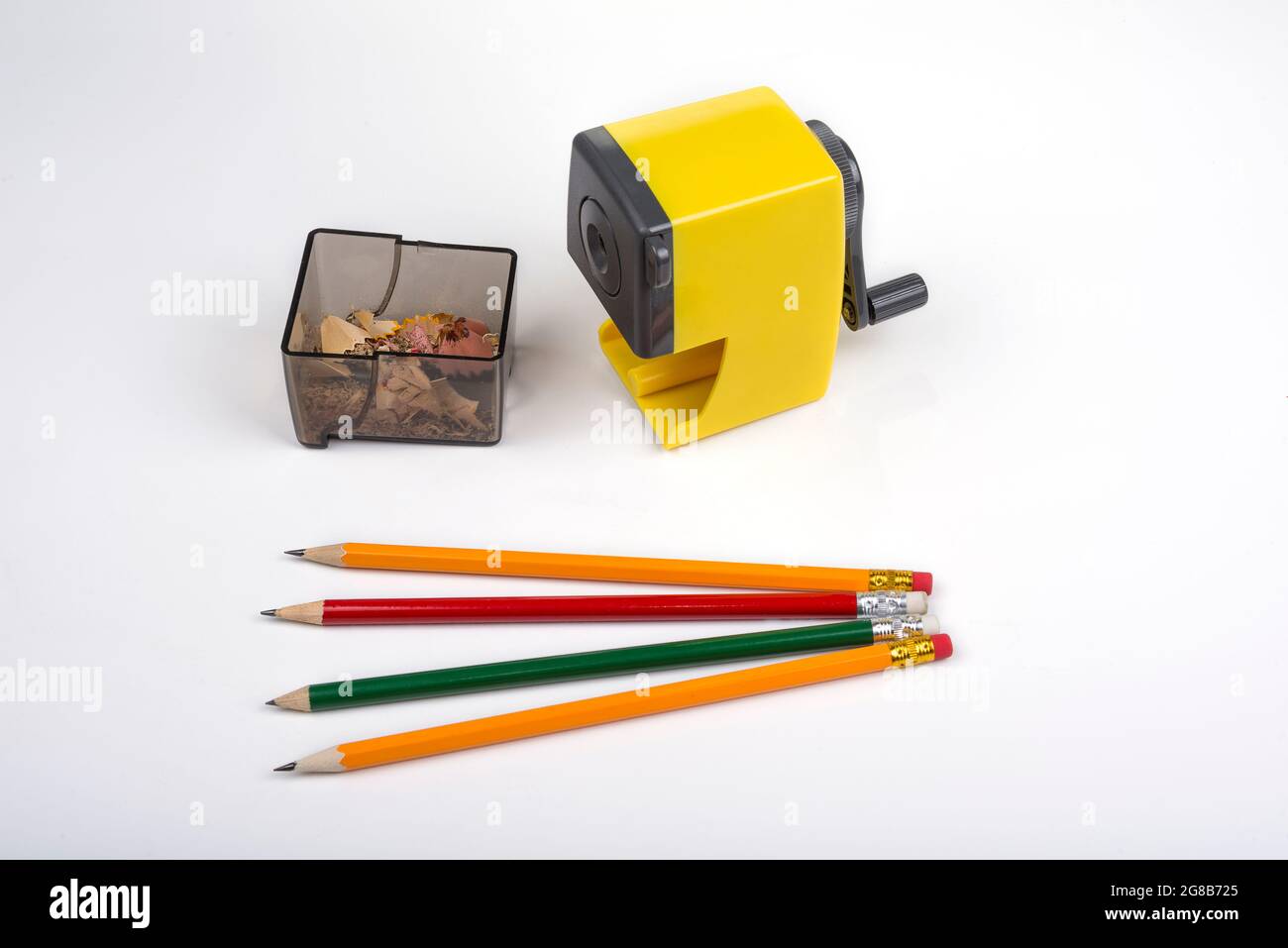 Pencil sharpener with a hand crank on a white Stock Photo Alamy
