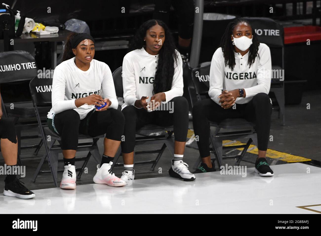 Las Vegas, Nevada, USA. 18th July, 2021. (L-R) Nigerian players and sisters Erica Erinma Ogwumike, Chiney Ogwumike and Nneka Ogwumike watch their team from the sideline during a pre-Olympic exhibition basketball game July 18, 2021, in Las Vegas. (Credit Image: © David Becker/ZUMA Press Wire) Stock Photo