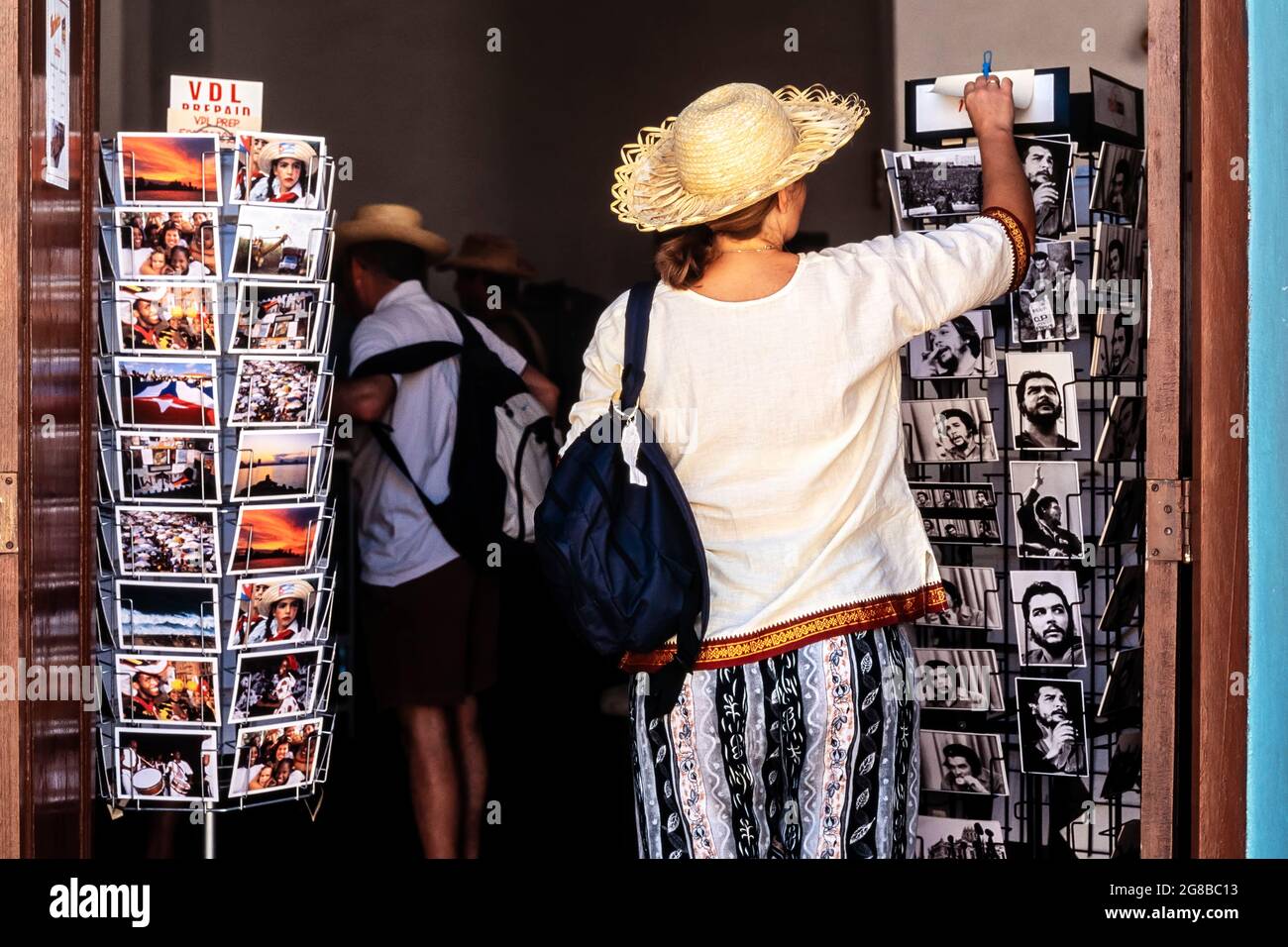 Tourist buying postcards at a shop in Havana, Cuba Stock Photo