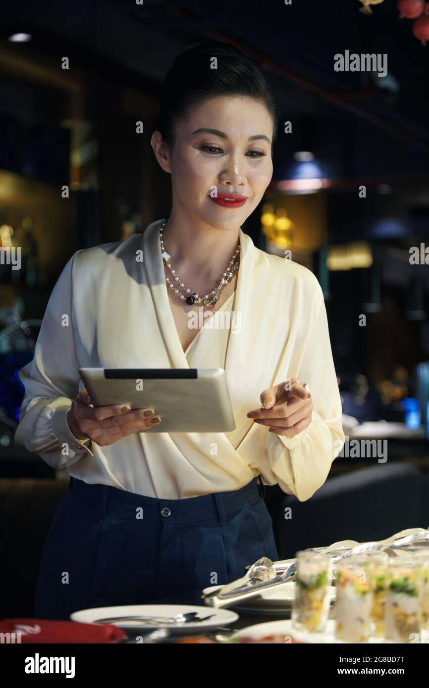 Attractive cocktail waitress hires stock photography and images Alamy