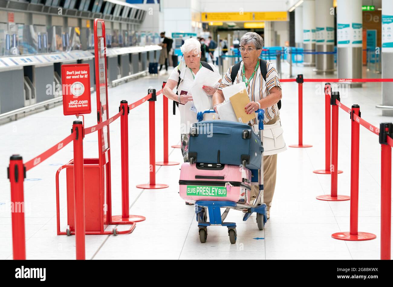 Maggie Smith (right) and her friend Rosemary Gallacher head to the Jet2