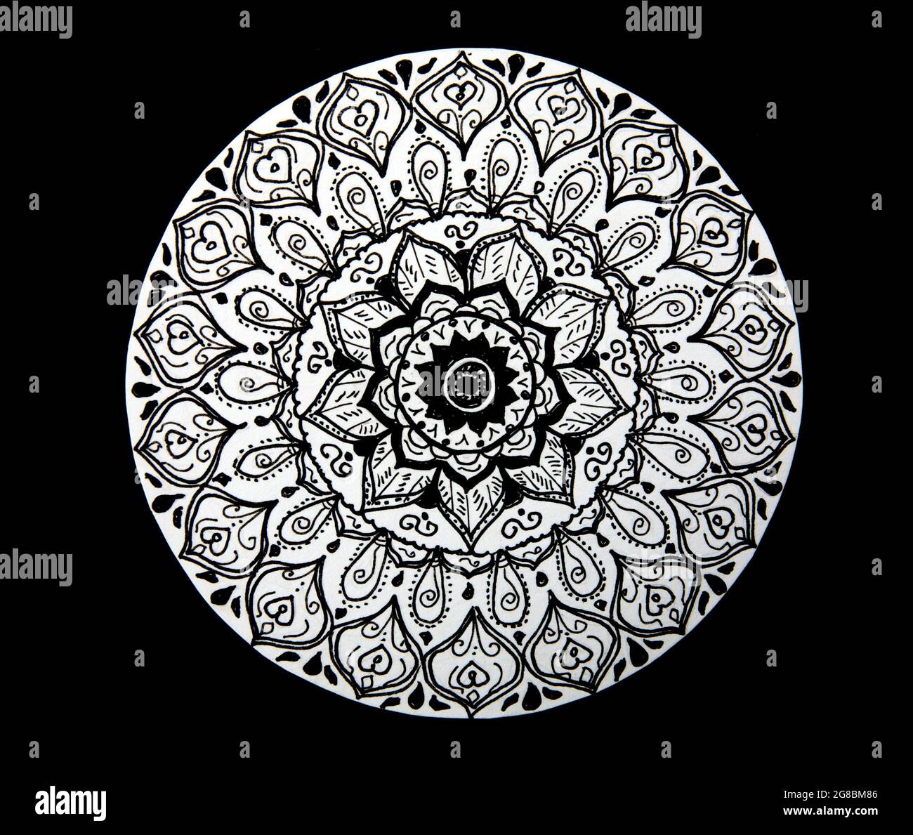 Flower mandala hand painted black and white Stock Photo - Alamy