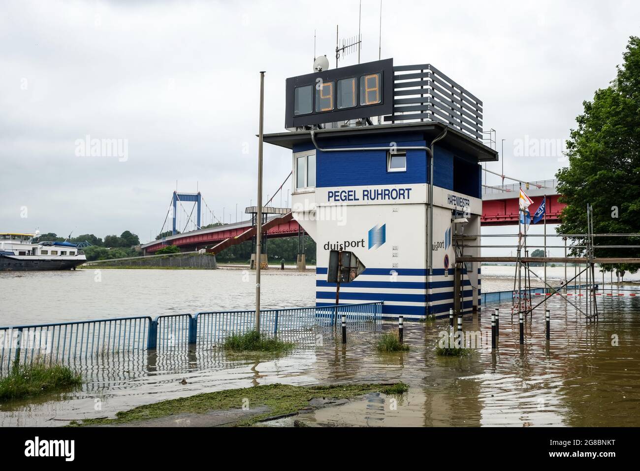 Duisburg, North Rhine-Westphalia, Germany - High water, Ruhrort gauge shows over 9 metres, Friedrich-Ebert-Bruecke in the back. Stock Photo