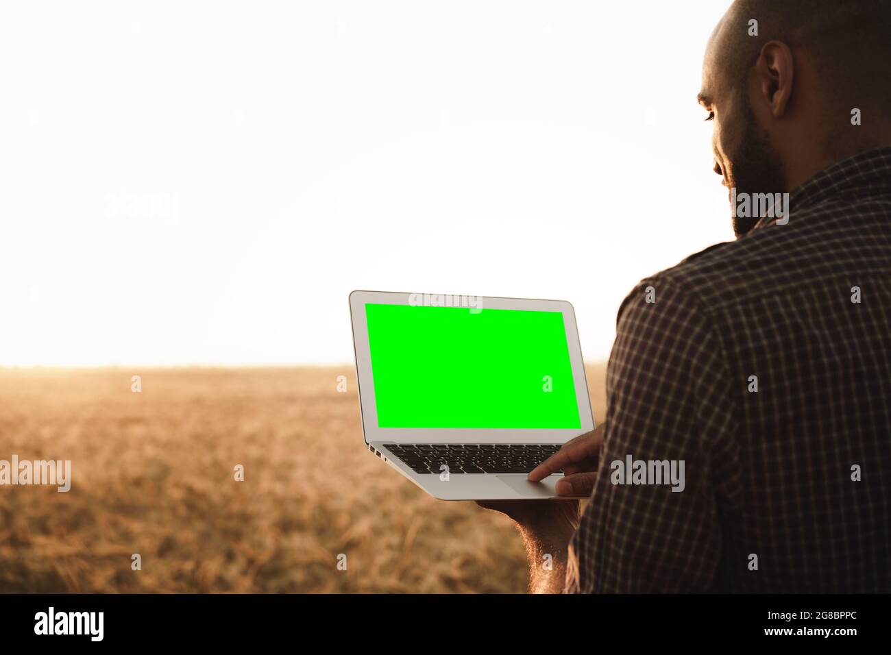 Businessman standing grain field hi-res stock photography and images ...