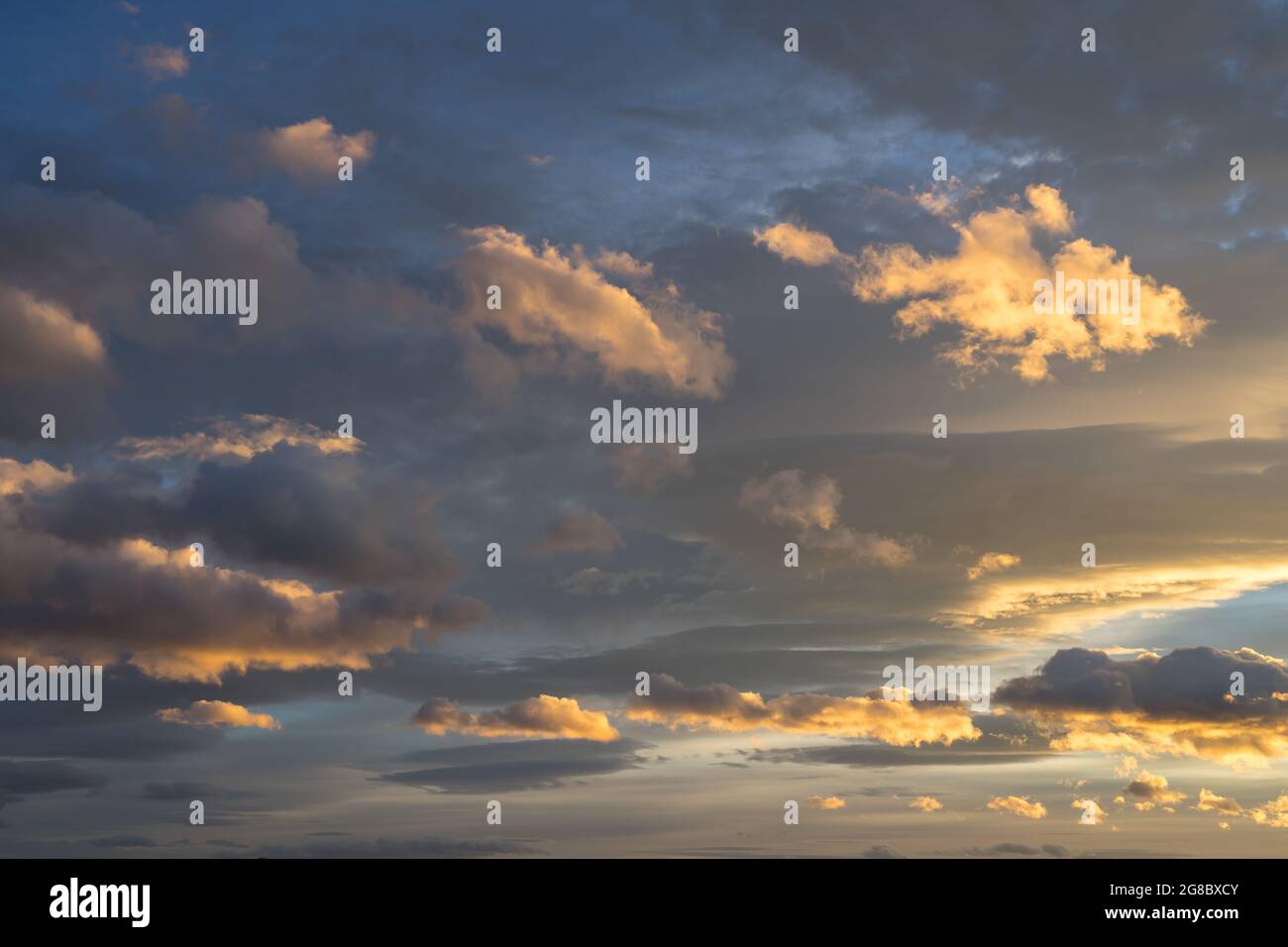 scenic sunset sky and colorful golden clouds natural background Stock ...