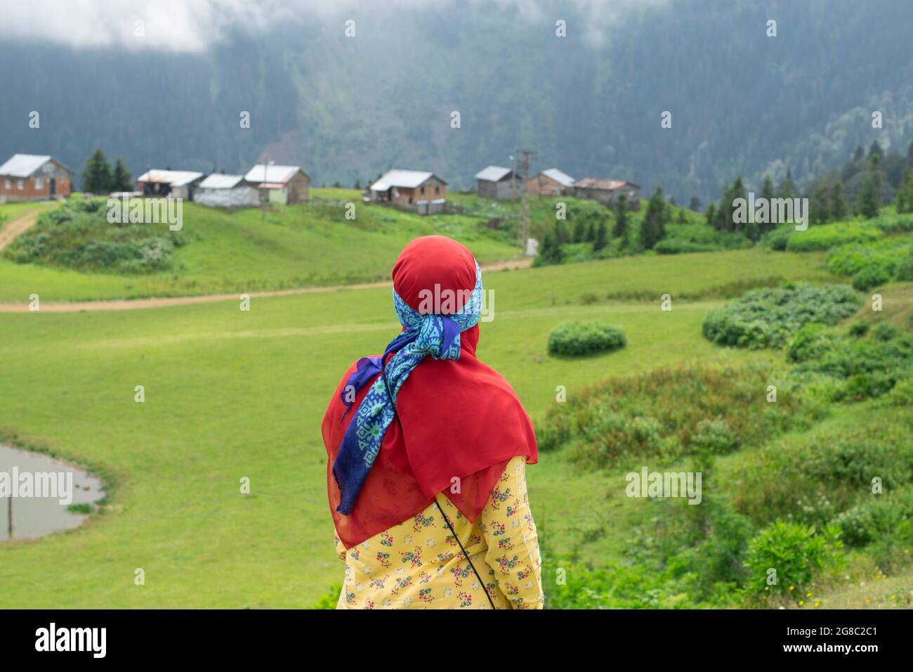 Rize, Turkey - August 16 2017 : Girl in local dress watching the ...