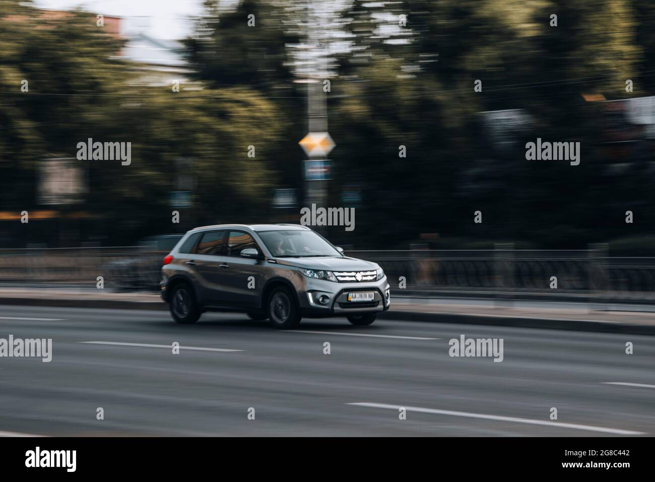 Ukraine, Kyiv - 16 July 2021: Silver Suzuki Vitara car moving on the street. Editorial Stock Photo