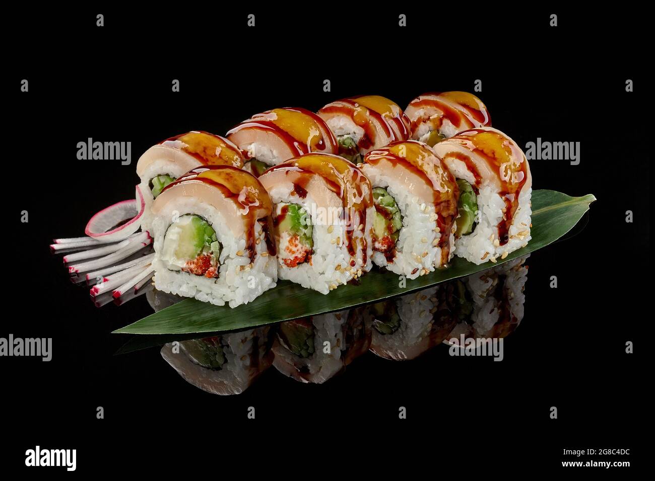 Sushi rolls with butterfish, cream cheese, cucumber, tobiko Stock Photo